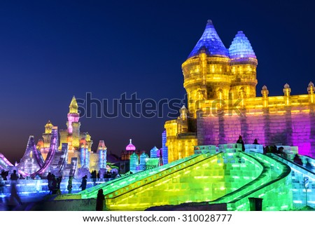 Harbin, China - January 6, 2015: People visit ice buildings in Harbin Ice and Snow World located in Harbin City, Heilongjiang Province, China.