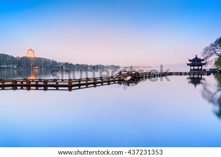 Landscape of West Lake. Long Bridge and Leifeng Pagoda. Located in Hangzhou City, Jiangsu Province, China.