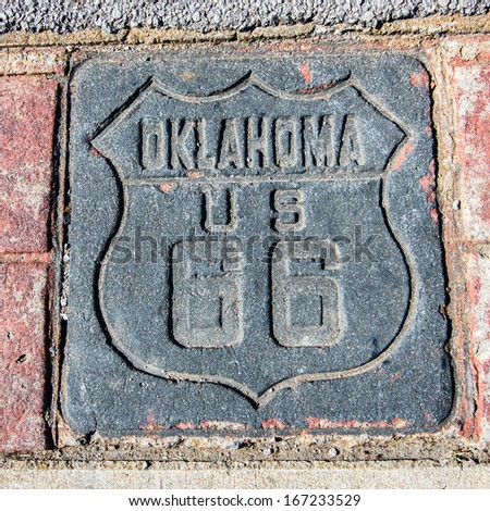 Route 66: Us 66 Shield, Stamped In Concrete, Poured Between Decorative Bricks, On The Tulsa Sidewalk, Oklahoma