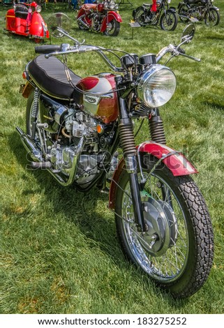 GROSSE POINTE SHORES, MI/USA - JUNE 16, 2013: A 1970 Triumph Bonneville motorcycle at the EyesOn Design car show, held at the Edsel and Eleanor Ford House.