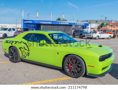 ROYAL OAK, MI/USA - AUGUST 15, 2014: A 2015 Dodge Challenger SRT Hemi Hellcat car at the Woodward Dream Cruise, the world's largest one-day automotive event. Woodward (M-1) is a National Scenic Byway.