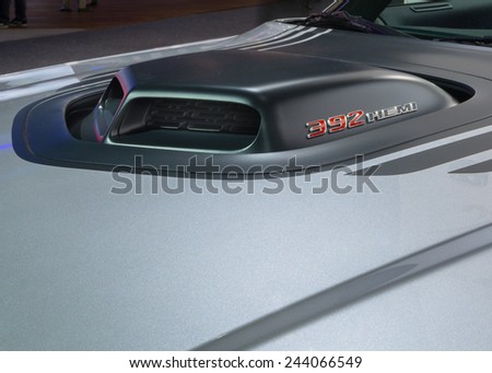 DETROIT, MI/USA - JANUARY 13, 2015: Dodge Challenger R/T Shaker hood scoop and Hemi logo at the North American International Auto Show (NAIAS).