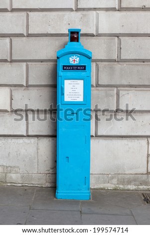 Blue police public call post, an original free police telephone box, by Mansion House, City of London.