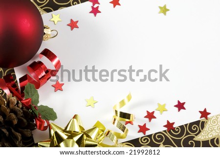 Christmas card with red and gold ornaments and copy space