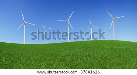 Five wind turbines on a green field. Green energy and environmental conservation symbols (XXXLarge).