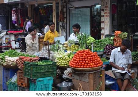Mumbai, India - Circa  January 2014 - Vendors selling vegetables at local fresh market