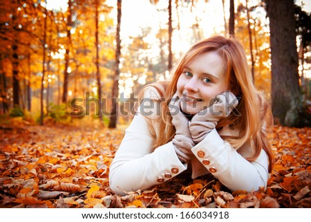 Young girl dreams about autumn