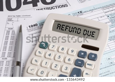 Tax Forms with Calculator that spells out REFUND DUE