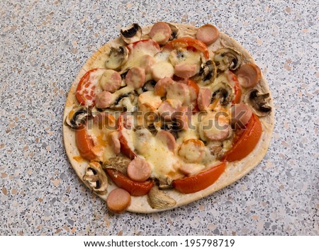 fresh juicy pizza at various stages of preparation