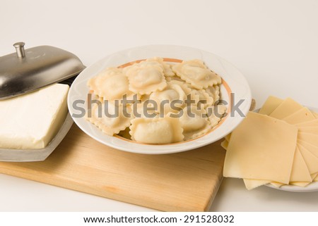 hot lunch with boiled a dumplings in an environment of bread of cheese and oil