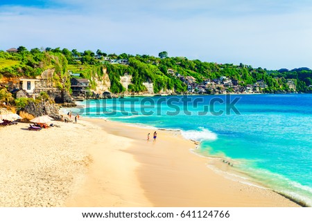 Bali seascape with huge waves at beautiful hidden white sand beach. Bali sea beach nature, outdoor Indonesia. Bali island landscape. Summer holidays at ocean beach. Travel vacation in Indonesia beach