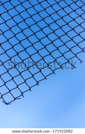 wire mesh of blue sky