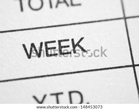 The word WEEK on a sales report form.