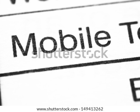 Place of customers phone numbers on a paper form closeup.