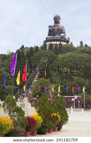 Hong Kong. Buddha statue on Lantau island. Lantau island is the world\'s tallest bronze Buddha statue. The Buddha sits on a pedestal in the form of a Lotus.