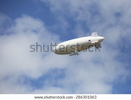 Russian airship in the sky.\
This airship soft system. It has the capability of vertical take-off. Navigation equipment can be used at any time of the day.