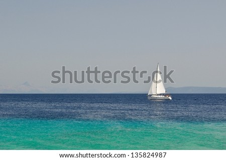 White boat alone at an open sea, Island Brac, Croatia