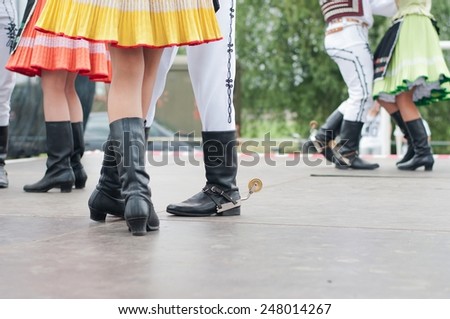 Fragment of Slovak folk dance with colorful clothes in Folk Festival