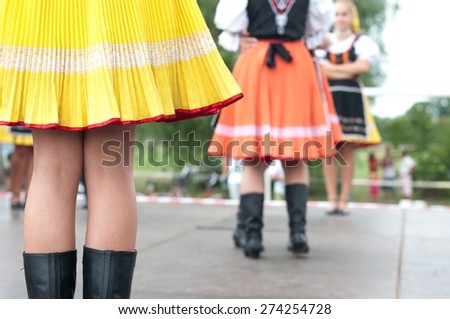 Fragment of Slovak folk dance with colorful clothes in Folk Festival