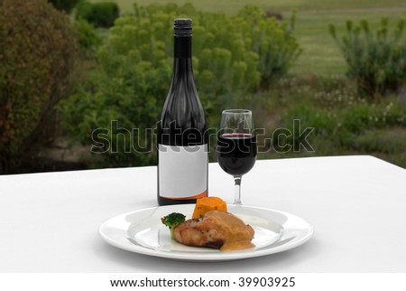 Pork Loin, served with a Roasted Pumpkin Timbale and Piquant Honey Sauce, accommpanied by a glass of Merlot