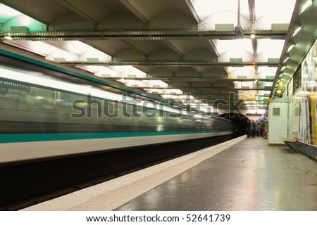 A train departing the station on the Metro, Paris, France