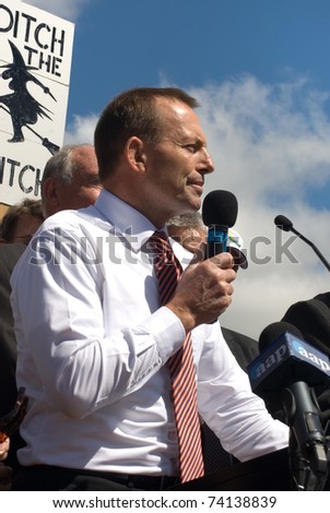 CANBERRA, AUSTRALIA - MARCH 23 : Tony Abbott, Federal Opposition Leader, on stage at the \'No Carbon Tax\' rally, held in front of Parliament House on March 23, 2011, in Canberra, Australia.