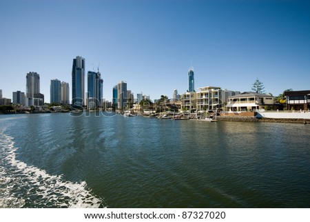 A waterway scene, with luxury homes and apartment buildings, Surfers Paradise, Queensland, Australia