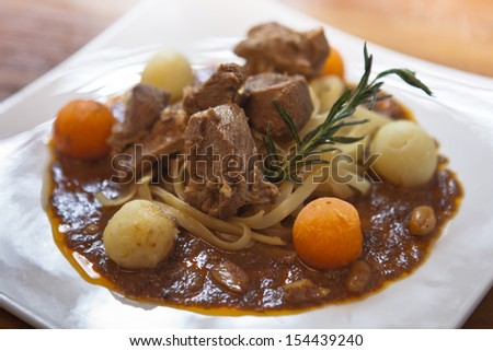 Fettuccine with beef curry sauce