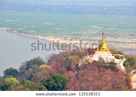 A pagoda is on Sagaing hill, Myamar. View frm the top of this hill.