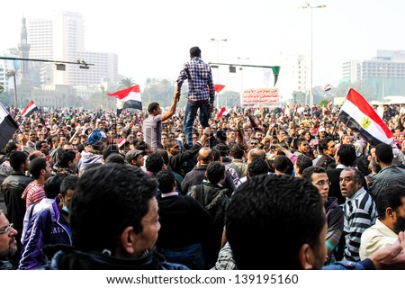 Cairo, Egypt - Nov 22-Thousands Of Protesters Flocked To Cairo'S Tahrir Square, Egypt, Nov 22, 2011. People Were Dead And Injured Because Of Tear Gas, Rubber Bullets Of Riot Police.