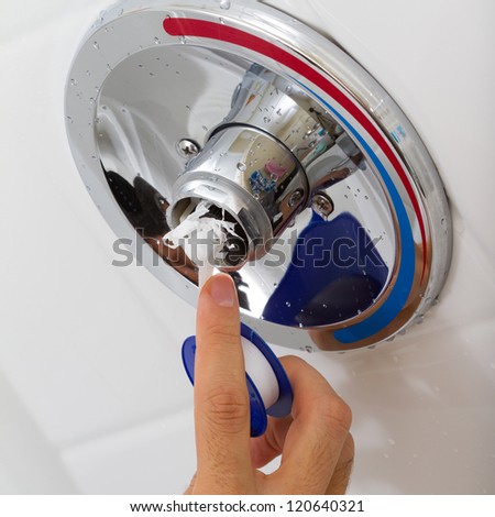 Fix of broken shower faucet cold and hot water in the bathroom