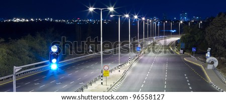 Empty highway at night without people and cars