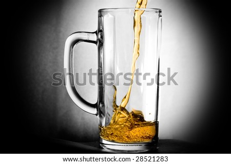 filling a glass of beer