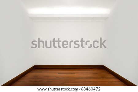 Empty white room with wooden floor