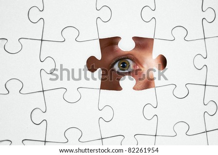 Human Resources concept: Business person through missing jigsaw puzzle