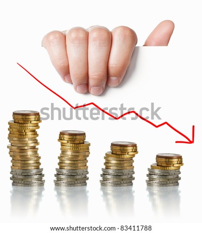 Financial crisis concept: Hand holding white paper with coins and negative graph