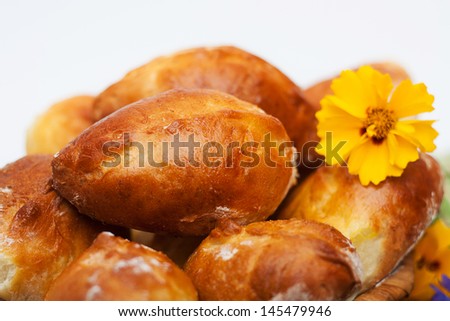 Pies with meat. Homemade cookies on a white background. Ukrainian cuisine.