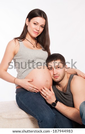 Portrait of happy couple expecting a baby. Pregnancy, family.