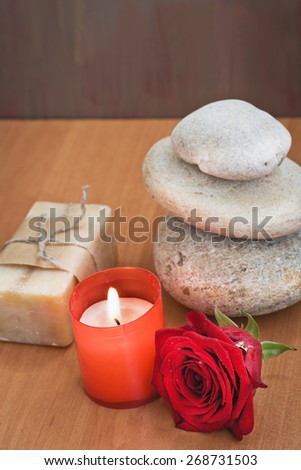 Composition with candles, flower and soap