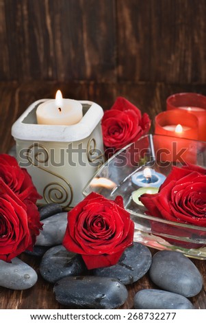 Composition with sea salt, candles, flower and soap