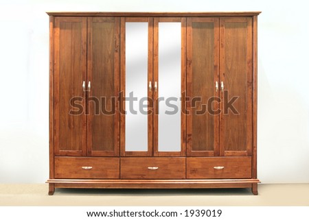 Large chestnut brown, rubber-wood, six door wardrobe with mirrors