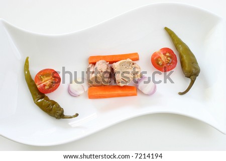 Healthy colorful vegetable platter with assorted vegetables and fish