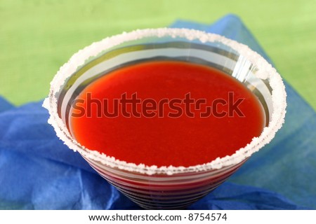 Tomato juice with Worchester sauce and spice served in a salt rimmed glass