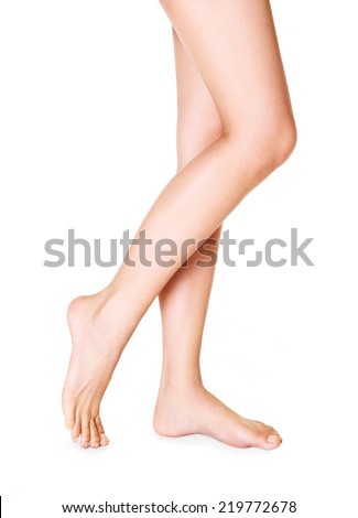 Beautiful woman legs isolated on white