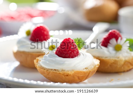 Buttery buns with creamy cheese and fresh raspberry