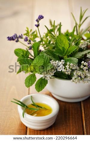 Fresh rosemary in olive oil and herb bouquet