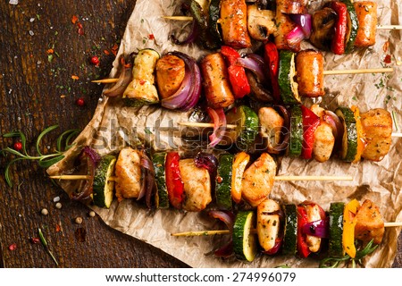 Skewers of grilled meat and vegetables