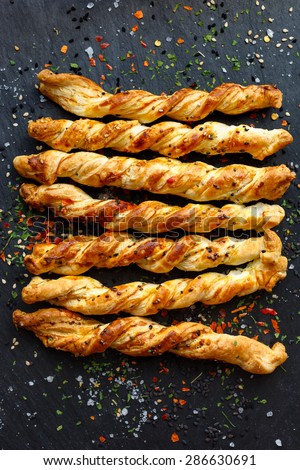 Cheese sticks with puff pastry and cheddar cheese. Delicious appetizer