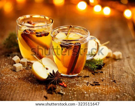Mulled cider with cinnamon, cloves, anise and citrus