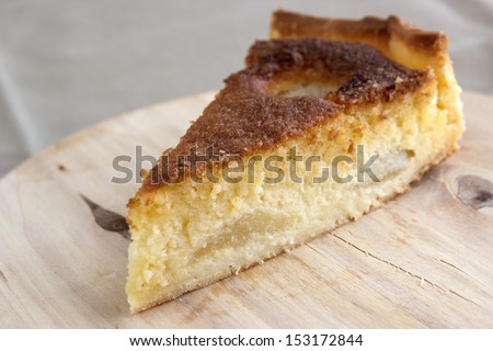 Traditional french Bourdaloue pie: a pie with almond marzipan cream and pears.